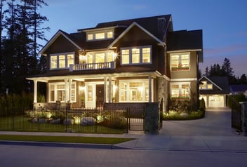 Canada, British Columbia, Surrey, front exterior of house illuminated at dusk (long exposure)