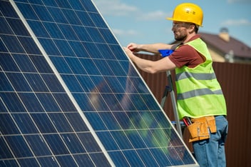 Engineer Installing Solar Panel