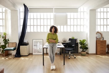 Female Entrepreneur Standing With Arms Crossed