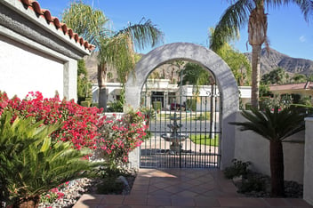 Inside Luxurious Xeriscaped Courtyard Looking To Street