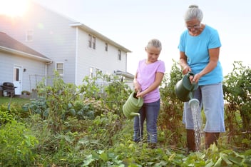 Older female farmer with granddaughter