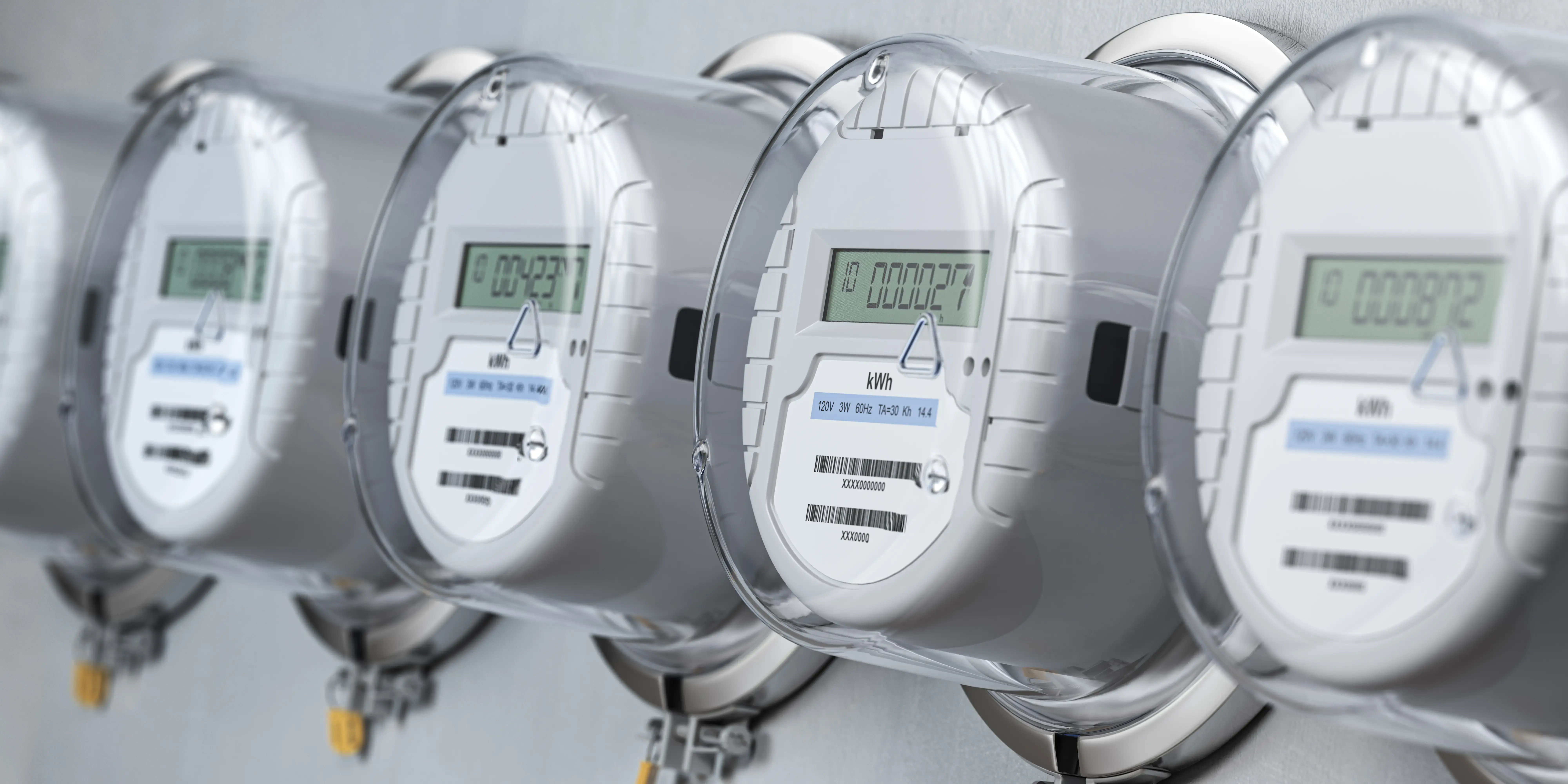 Digital electric meters in a row measuring power use. Electricity consumption concept.