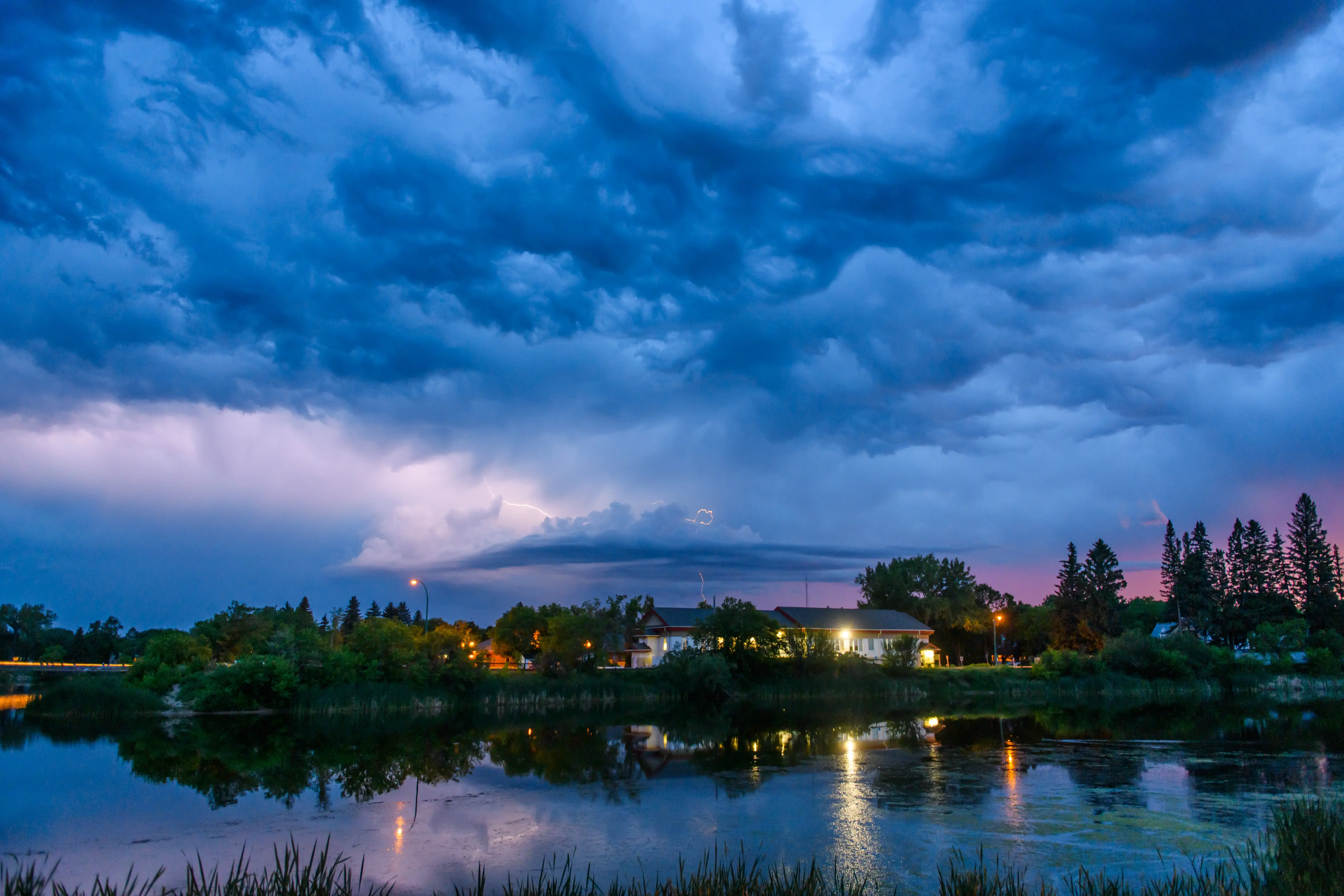 Dramatic sky over buildings and water, Ontario, Canada