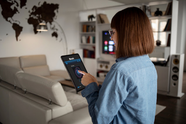 young-woman-using-home-technology.jpg